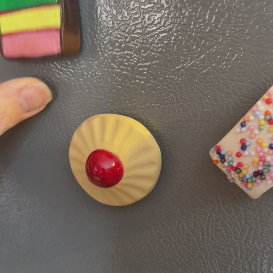 Italian Cookie Magnets close up on fridge.
